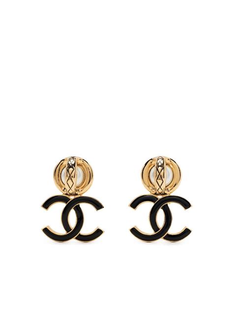 aretes chanel de oro.